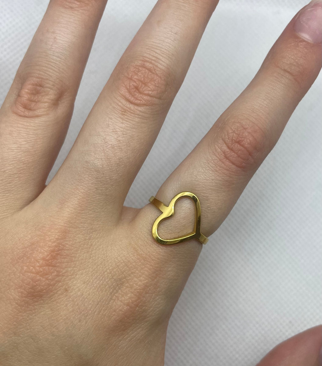 Gold sideways heart ring