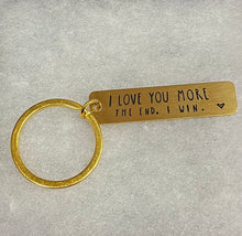 “I love you more the end. I win.” Keychain